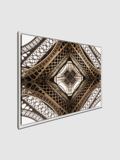 A canvas print featuring a close-up geometric pattern of the Eiffel Tower's structure.
